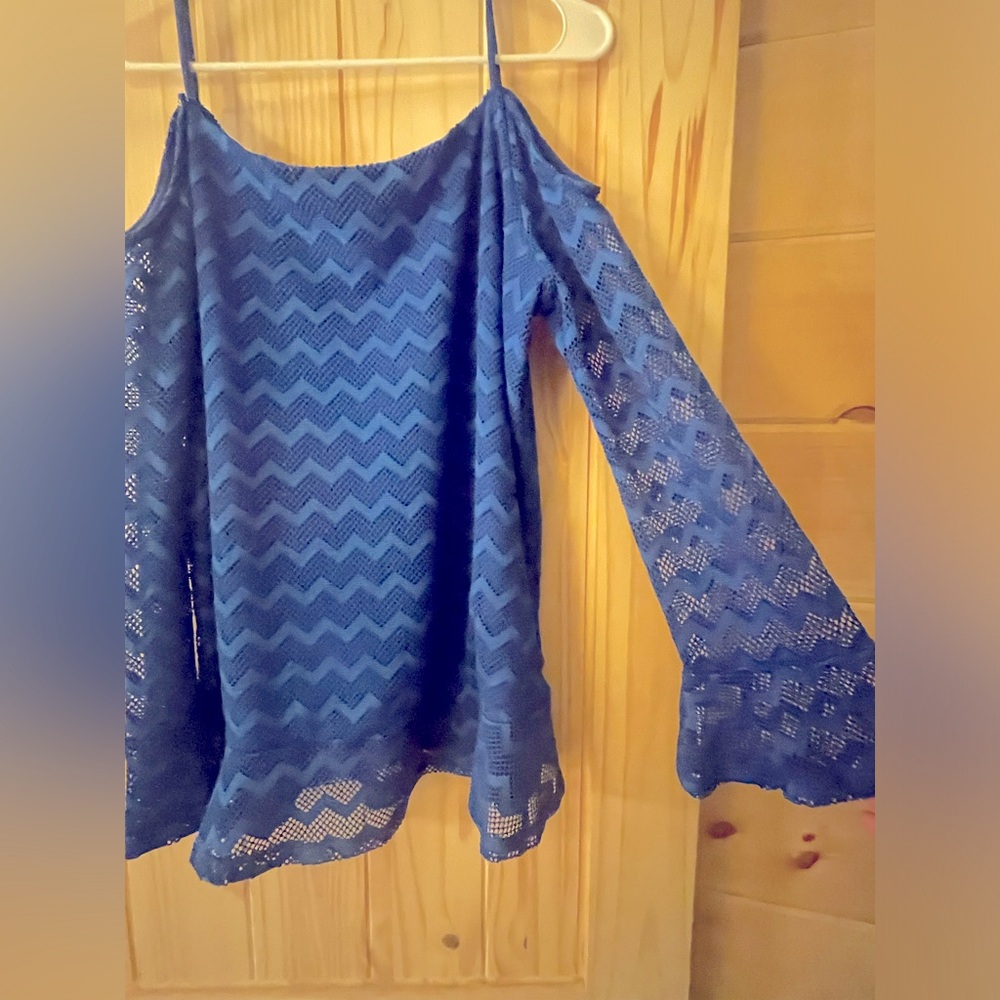 Top with sheer sleeves, peek a boo shoulders, straps